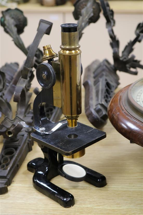 A lacquered brass microscope by Seibert Wetzlar, cased